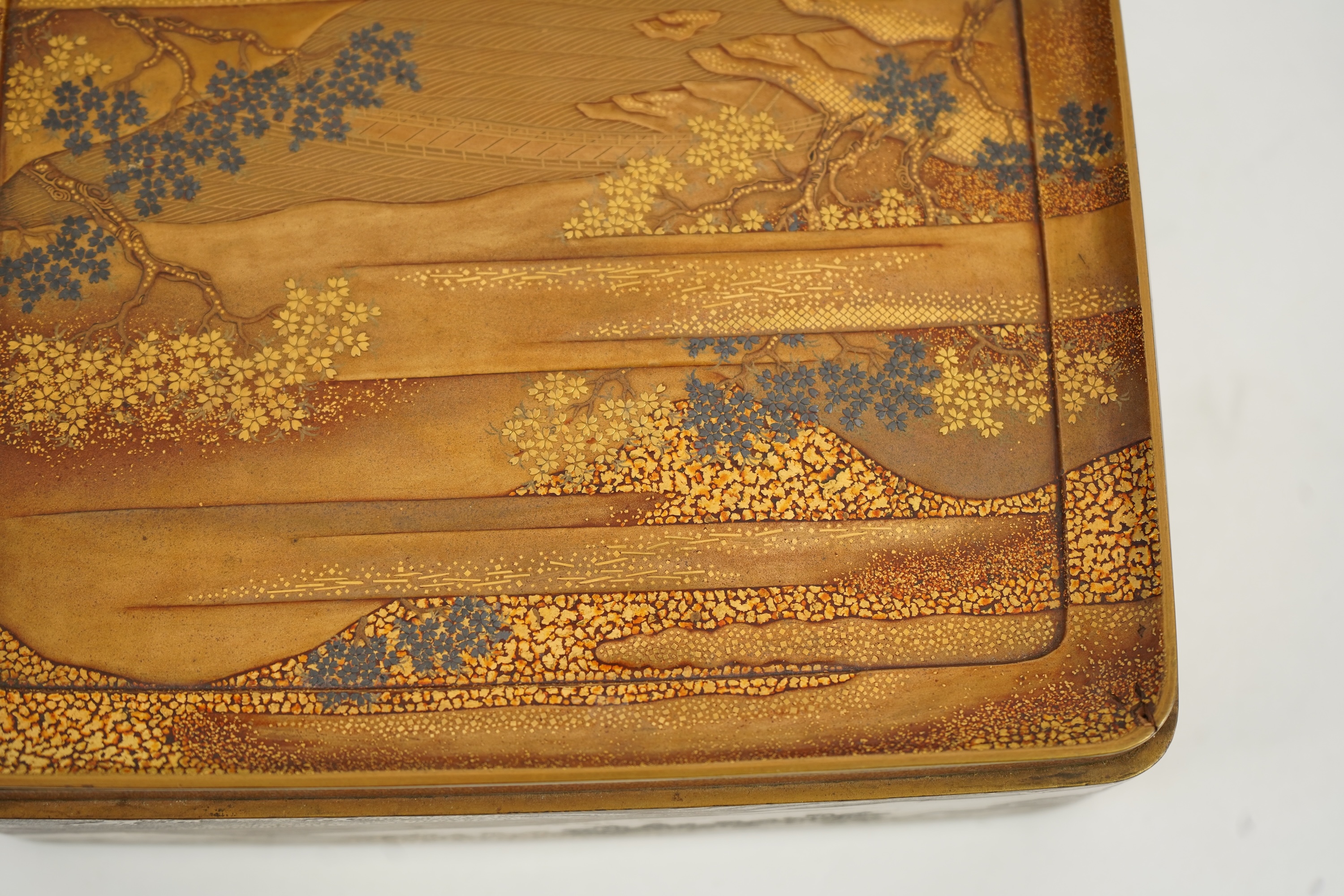 A Japanese gold lacquer ‘landscape’ box, tray and cover, 19th century